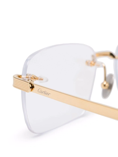 Shop Cartier Rimless Square Eyeglasses In Gold