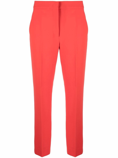 Shop Moschino Tailored Cropped Trousers In Red