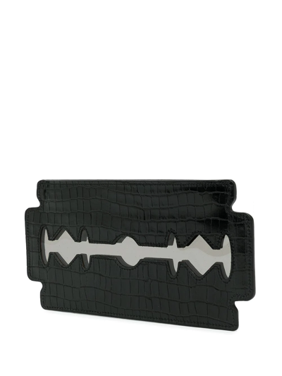 Shop Undercover Blade Crocodile-effect Clutch Bag In Schwarz