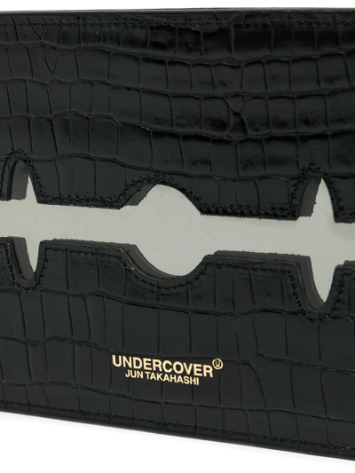 Shop Undercover Blade Crocodile-effect Clutch Bag In Schwarz