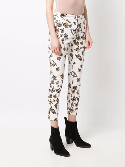 Shop Love Moschino Butterfly-print Cotton Skinny Trousers In Weiss