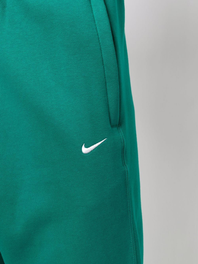Shop Nike Swoosh Logo Track Pants In Grün