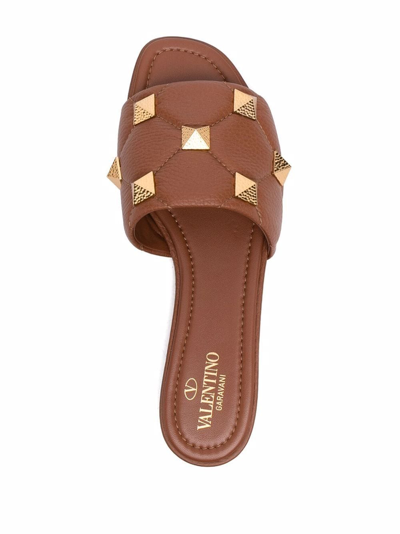 Shop Valentino Roman Stud Flat Sandals In Braun