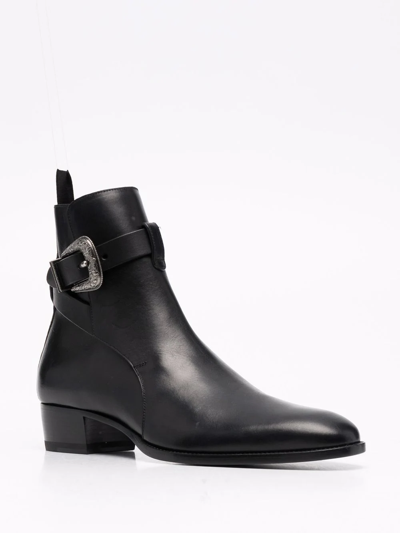 Shop Saint Laurent Wyatt Buckled Boots In Schwarz