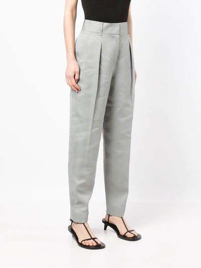 Shop Goodious Tapered-leg Trousers In Grün