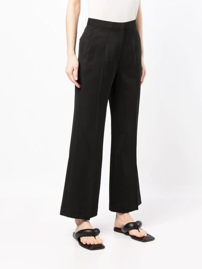 Shop Goodious Cropped Boot-cut Trousers In Schwarz