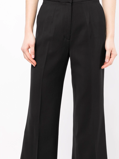 Shop Goodious Cropped Boot-cut Trousers In Schwarz