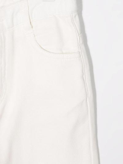 Shop Douuod Mid-rise Flared Jeans In White