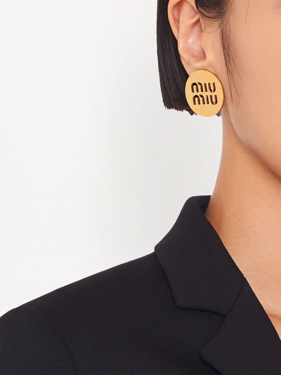 Shop Miu Miu Miu Logo Earrings In Gold