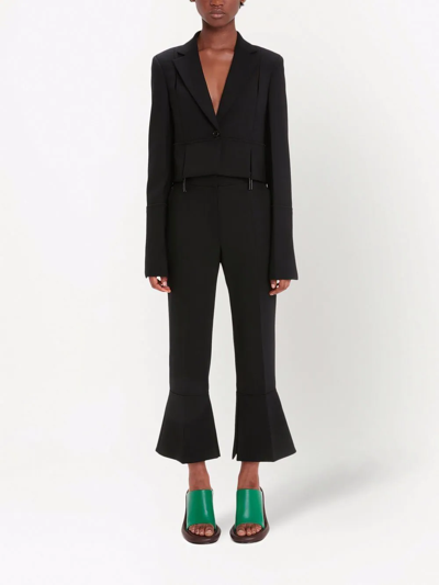 Shop Jw Anderson Cropped Flared Trousers In Black