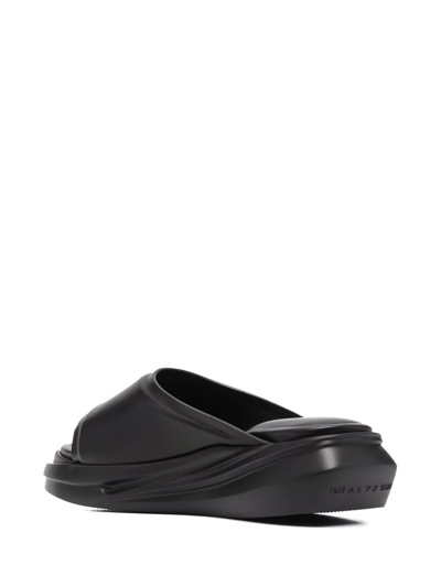 Alyx Leather Mono Slides In Schwarz