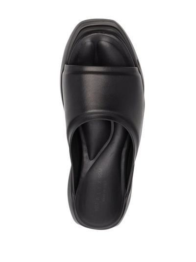 Alyx Leather Mono Slides In Schwarz