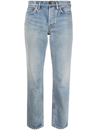 Shop Saint Laurent Washed Cropped Jeans In Blue