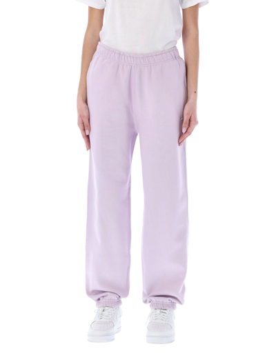 Shop Nike Solo Swoosh Fleece Sweatpants In Purple