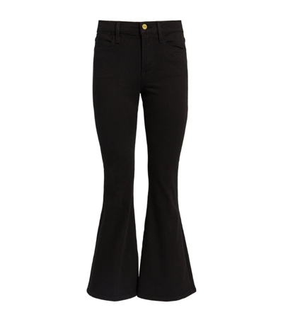 Shop Frame Le Pixie High-rise Flared Jeans In Black