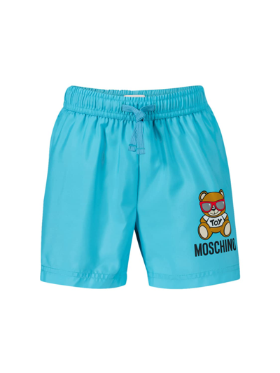 Shop Moschino Kids Swim Shorts For Boys In Blue