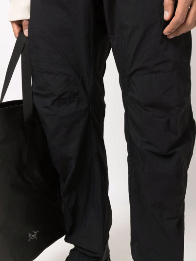 Shop Ten C Tapered-leg Trousers In Schwarz