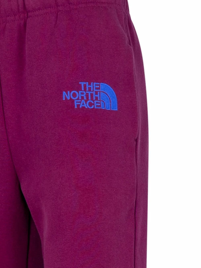 Shop The North Face X Kaws Logo-embroidered Track Pants In Violett