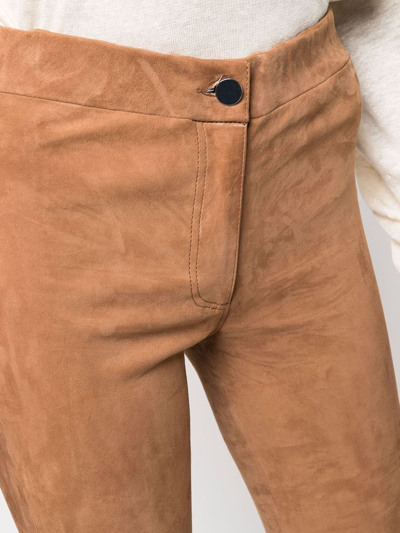 Shop Arma Flared Leather Pants In Braun