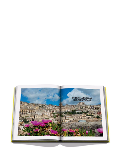 Shop Assouline Travel By Design Coffee Table Book In Gelb