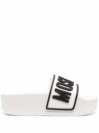 Shop Moschino Slides Sandals With Embossed Logo In White