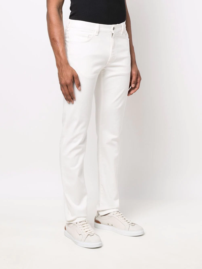 Shop Ermenegildo Zegna Tapered-leg Jeans In White