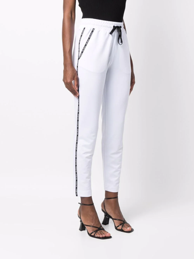 Shop Love Moschino Logo-tape Drawstring Track Pants In White