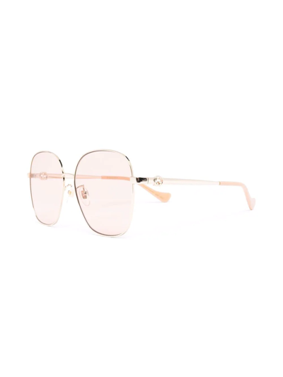 Shop Gucci Oversize Rounded Sunglasses In Gold