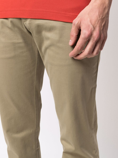 Shop Tommy Hilfiger Slim-cut Chino Trousers In Grün