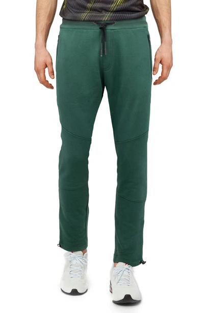 Shop X-ray Zip Pocket Fleece Joggers In Forest Green