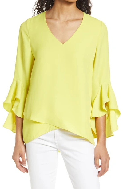Shop Vince Camuto Flutter Sleeve Tunic In Lemon Yellow