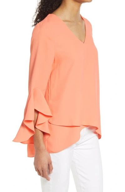 Shop Vince Camuto Flutter Sleeve Tunic In Coral