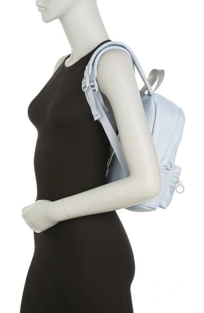 Shop Madden Girl Neoprene Backpack With Crossbody Pouch In Light Blue