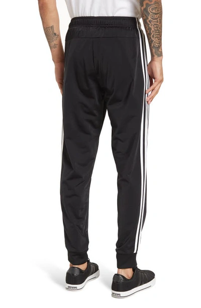Shop Adidas Originals 3-stripes Tricot Joggers In Black/white