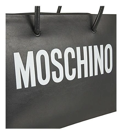 Shop Moschino Logo Print Small Leather Tote In Black