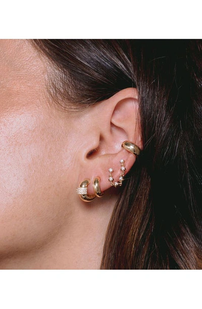 Shop Zoë Chicco Half Round Huggie Earrings In 14k Yellow Gold