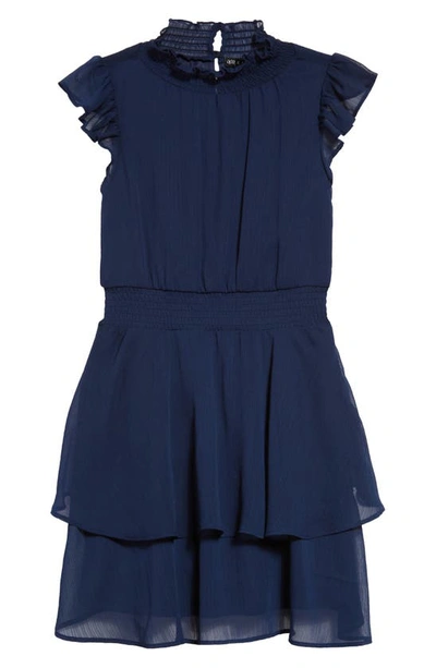 Shop Ava & Yelly Kids' Tiered Ruffle Smocked Mock Neck Dress In Light Navy Blue