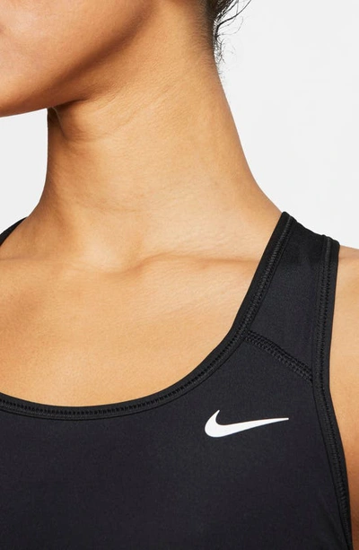 Shop Nike Swoosh Dri-fit Racerback Sports Bra In Black/ White