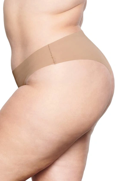Shop Skims Naked Cheeky Hipster Thong In Clay