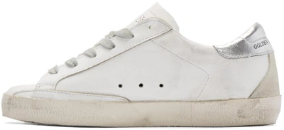 Shop Golden Goose White & Silver Superstar Low-top Trainers