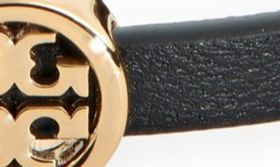 Shop Tory Burch Miller Leather Bracelet In Tory Gold / Black / Cuoio