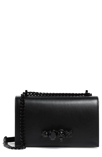 Alexander Mcqueen Blackout Leather Crossbody Knuckle Bag In Black