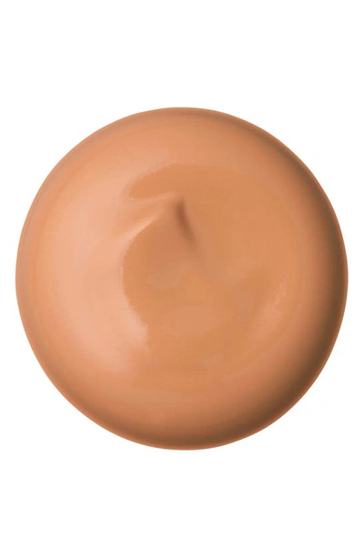 Clé De Peau Beauté Radiant Cream Foundation In O50 Tan Ocher