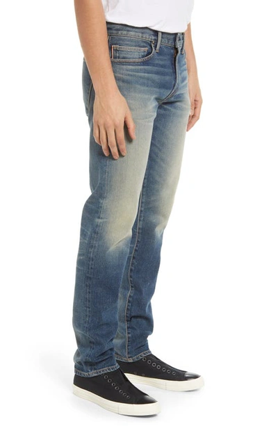 Shop Kato The Pen Slim 14-ounce Stretch Selvedge Jeans In Slash