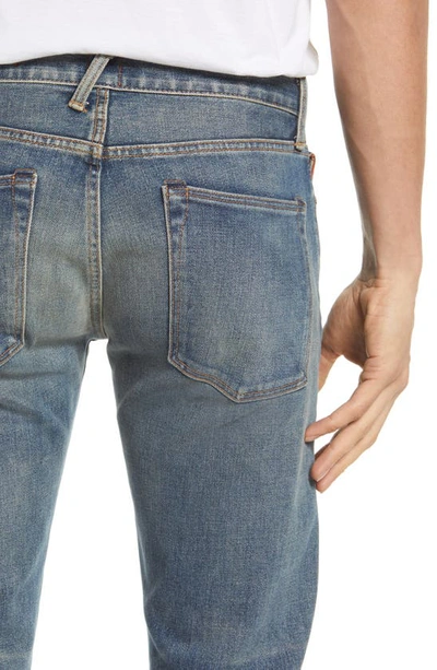 Shop Kato The Pen Slim 14-ounce Stretch Selvedge Jeans In Slash