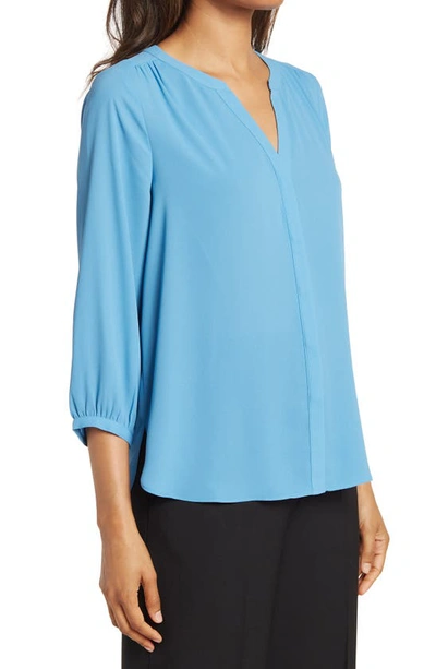 Shop Nydj High-low Crepe Blouse In Parisian Blue