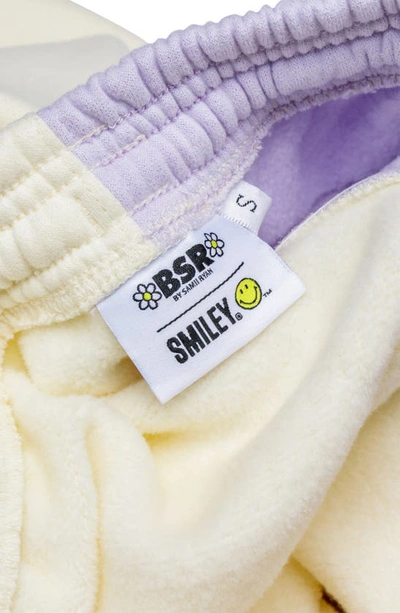 By Samii Ryan Smiley® X  Growing Smiles Colorblock Fleece Joggers In Lavender