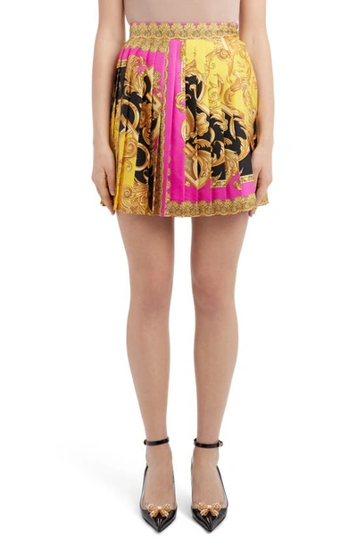 Shop Versace Barco Print Pleated Silk Miniskirt In Fuchsia