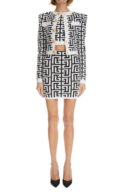 Shop Balmain Maxi Monogram Jacquard Wool Blend Miniskirt In Ead Noir Blanc Eab