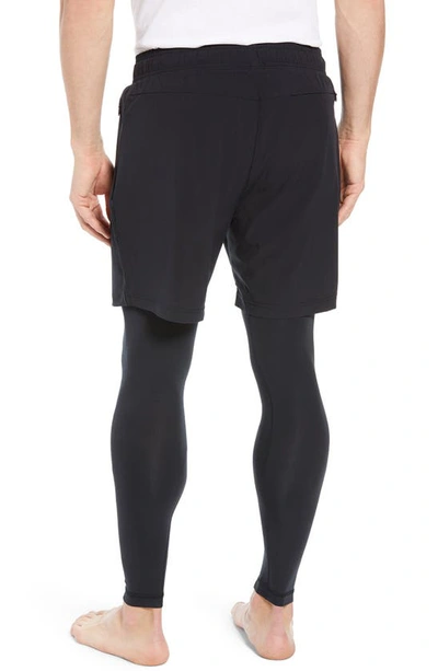 Shop Alo Yoga Stability 2-in-1 Athletic Tights In Black/ Black
